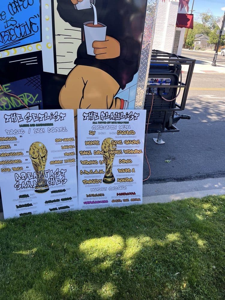 The Setlist and The Playlist menu boards beside the truck